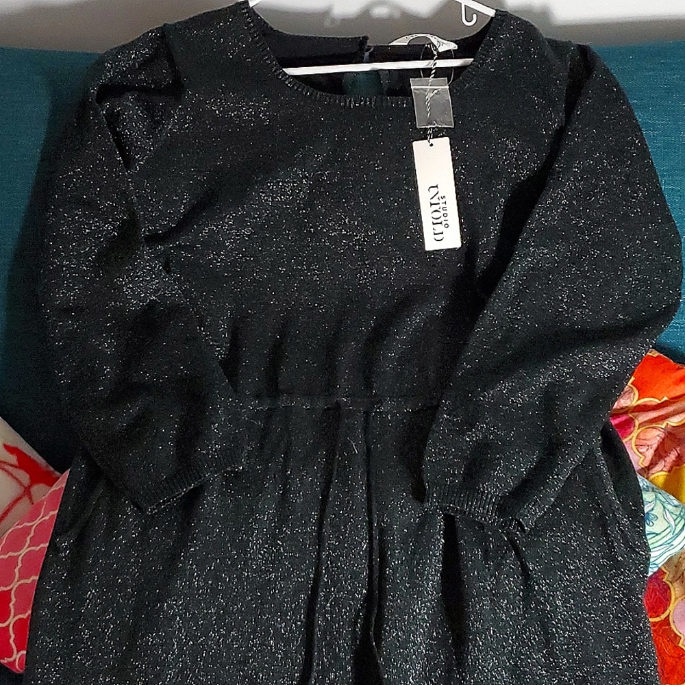 Black, sparkly, long sleeved, full length, jumpsuit for winter holidays! Size 18